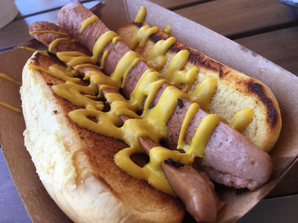 Split Griddled Hot Dog with Mustard drizzle