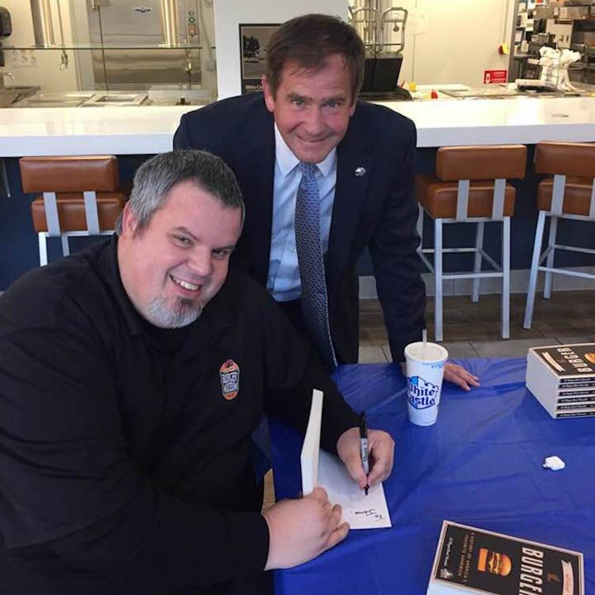 Burger Beast signing White Castle Vice President Jamie Richardson's Book