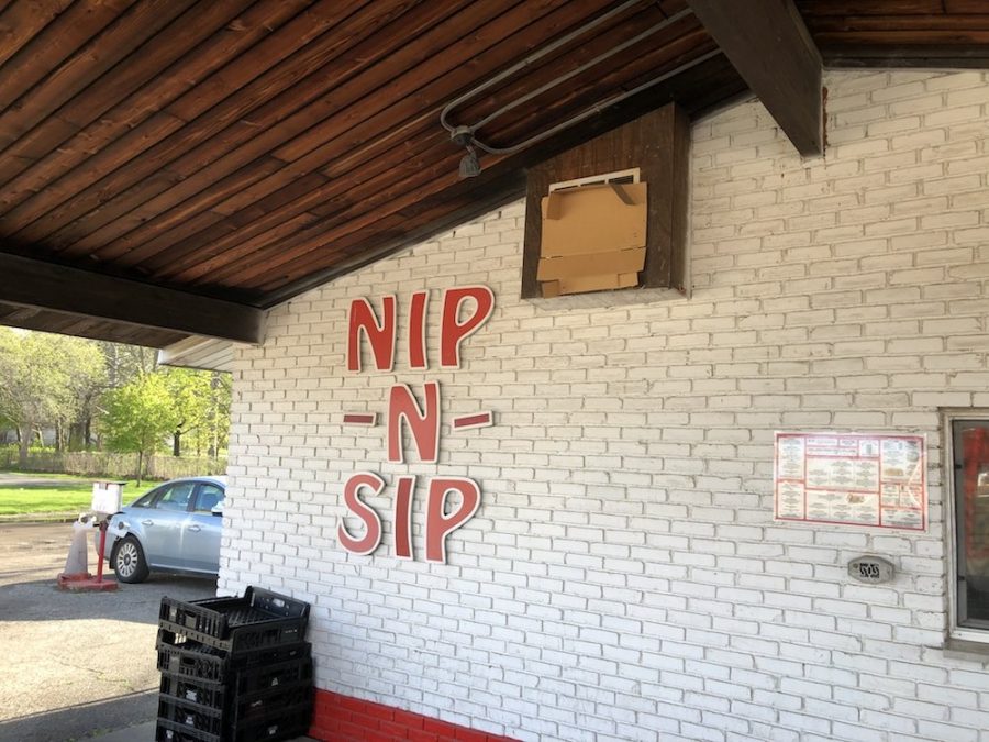 Wall sign from Nip N Sip in  Lansing, Michigan
