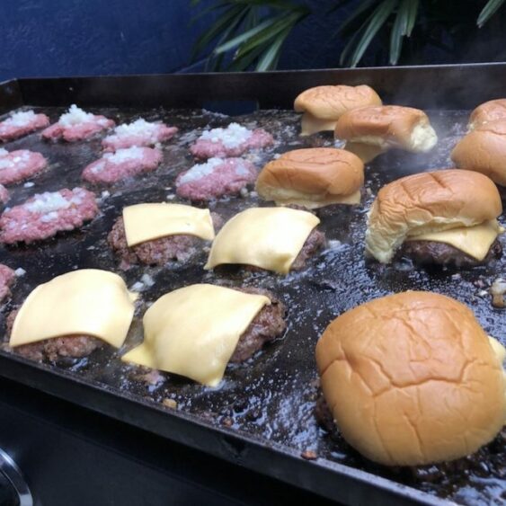 Smash Burgers cooking on a Blackstone Grill