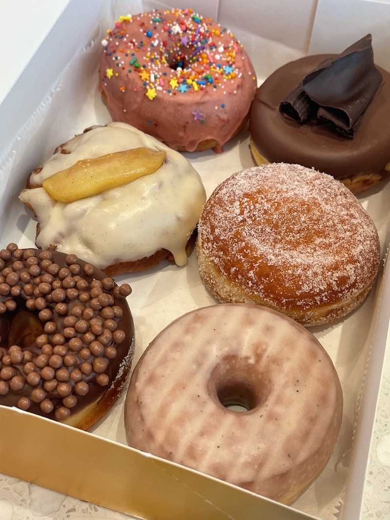 Box of Max'd Out Donuts in North Miami Beach, Florida