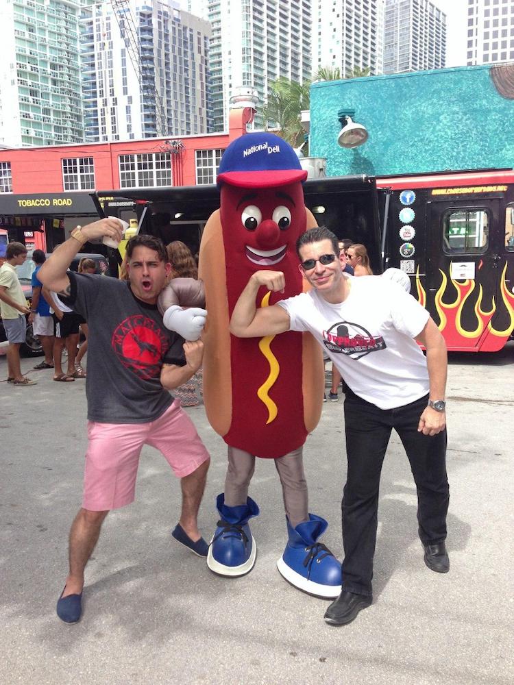 Gio & Rick flexing with the National Deli Giant Wiener