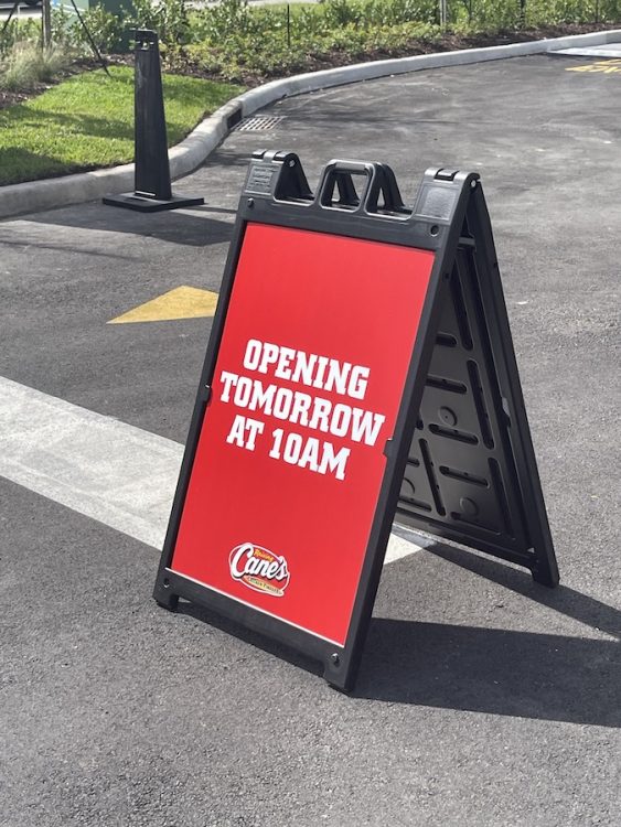 Opening Tomorrow at 10AM Sign  from Raising Cane's in Homestead, Florida