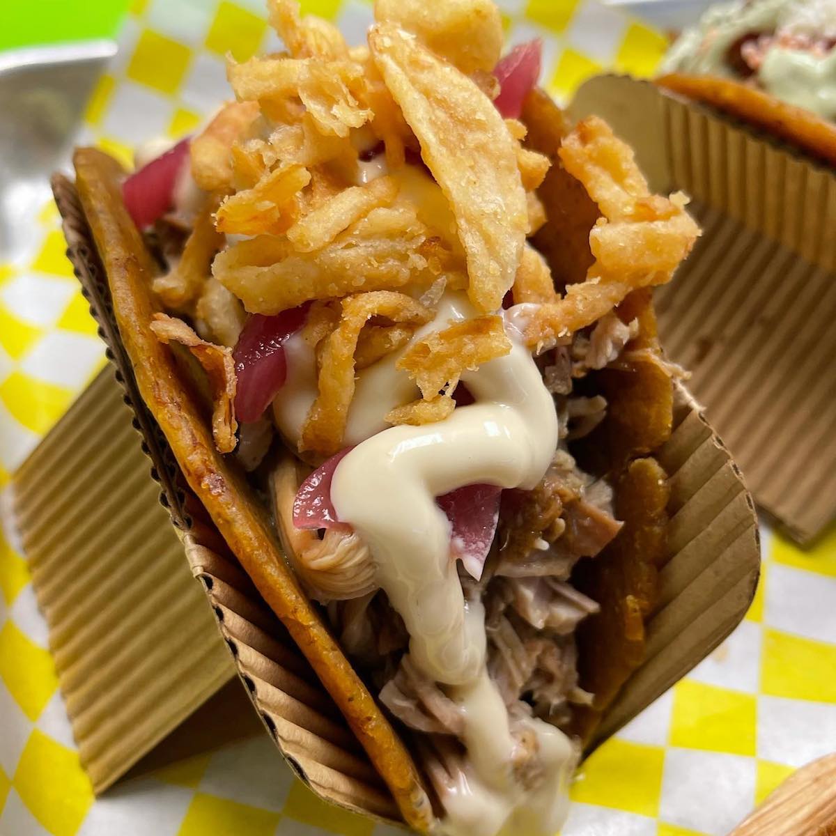 Brisket and Pulled Pork Tacoton from The Crazy Toston in Miami, Florida