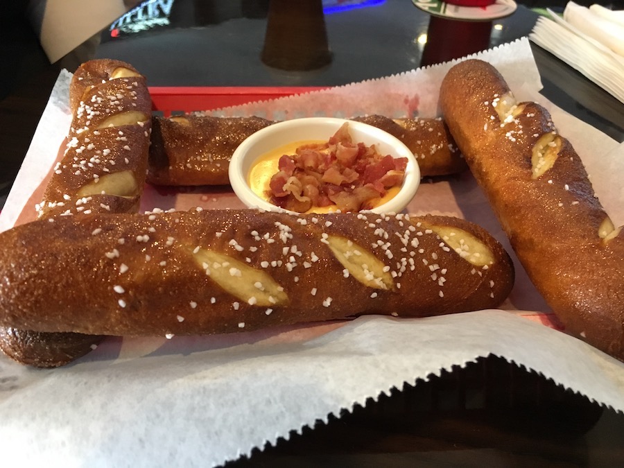 Soft pretzels with bacon beer cheese from Burgers & Suds in Pompano Beach, Florida