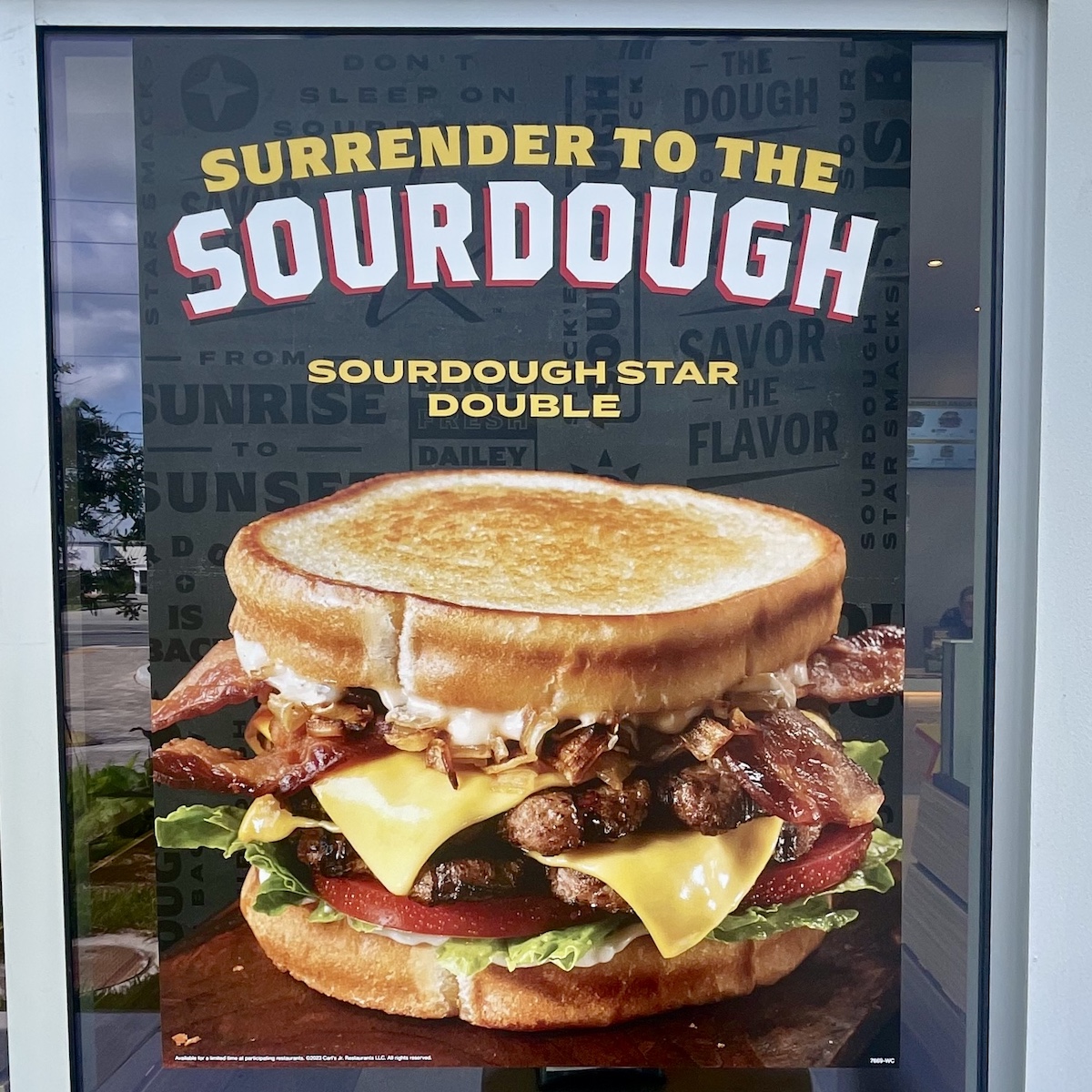 Surrender to the Sourdough Poster at Carl's Jr. in Doral, Florida