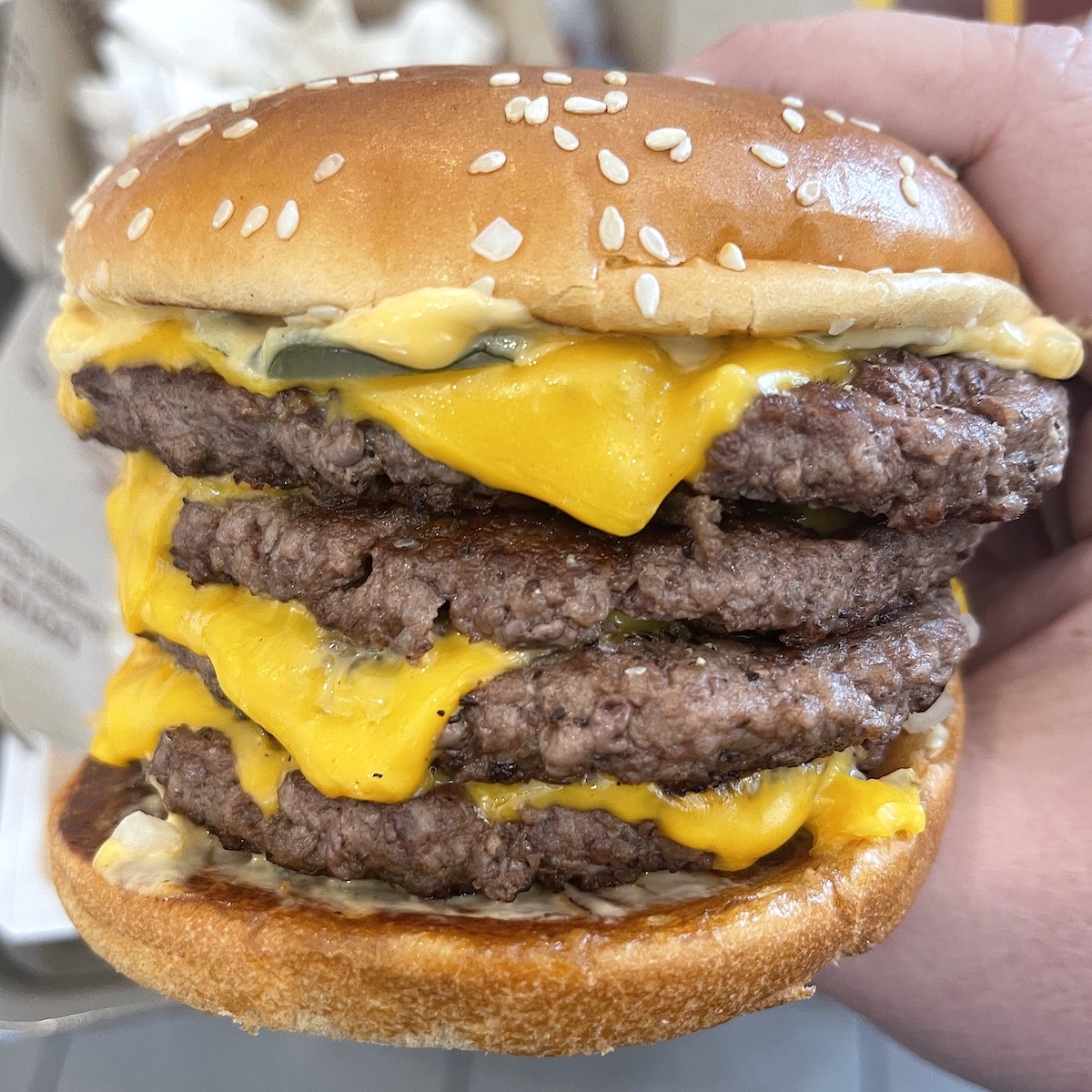 Holding the McDonald's Quadruple Quarter Pounder with Cheese