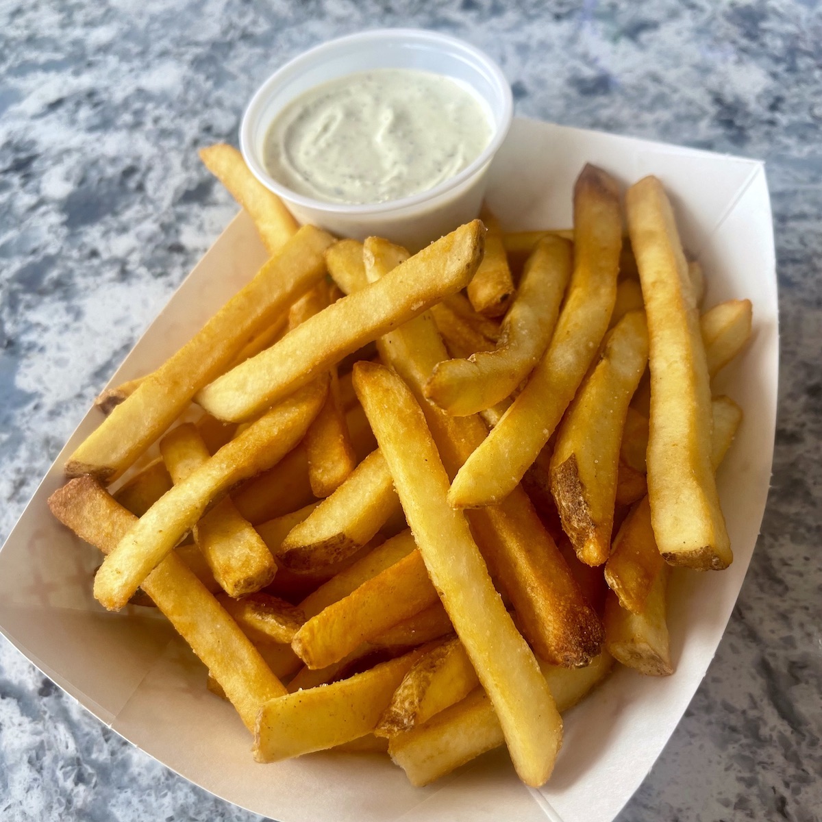 Fresh-cut Fries with Housemade Ranch Sauce from PZZA in Boca Raton, Florida