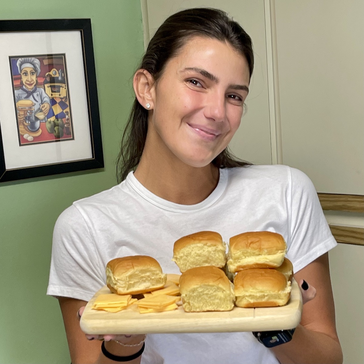 Alex holding the Bread and Folded Cheese Slices