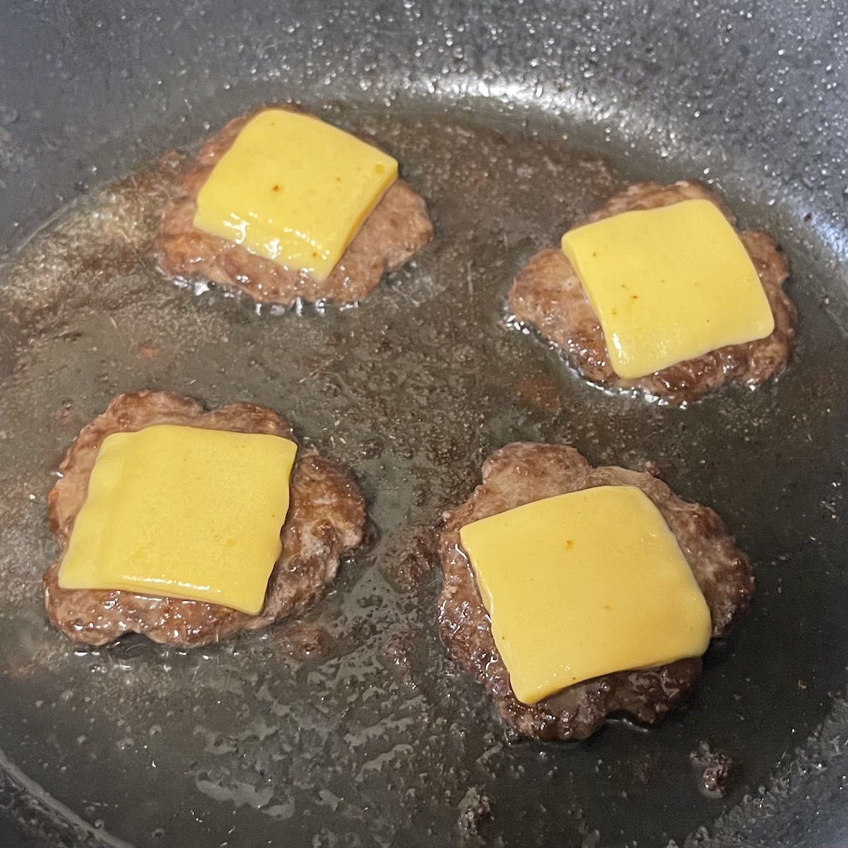 Holten's Chop House Smashed Sliders with Melting Cheese